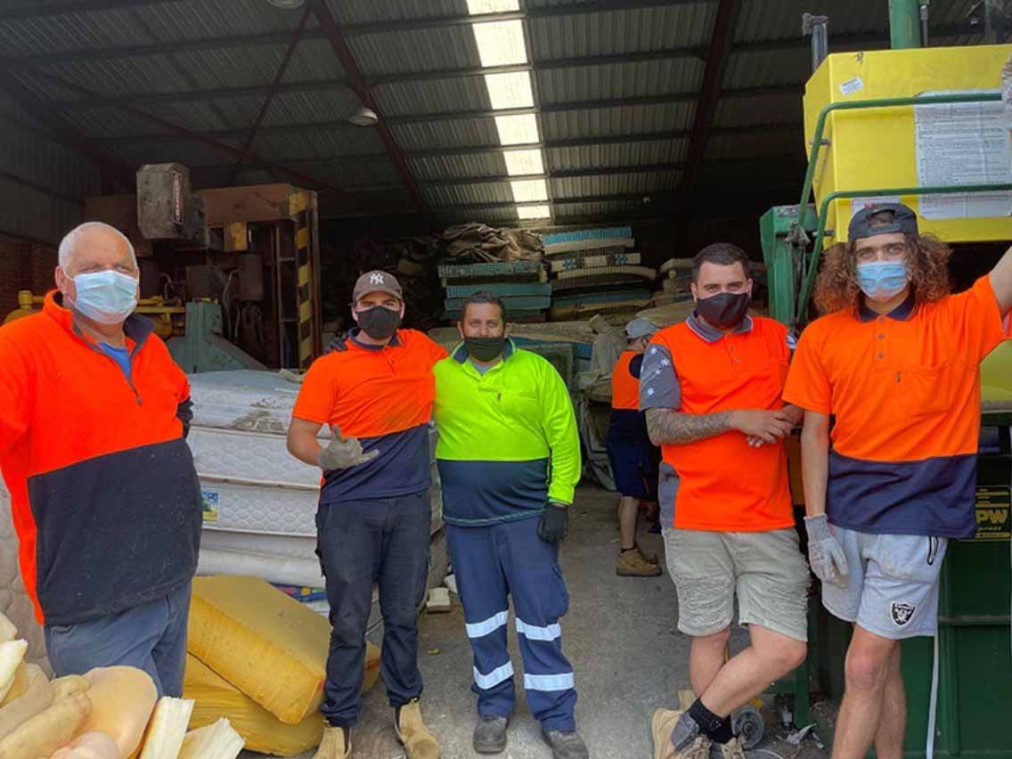 Malcolm Walker (Uncle Tolly) left with workmates he is mentoring